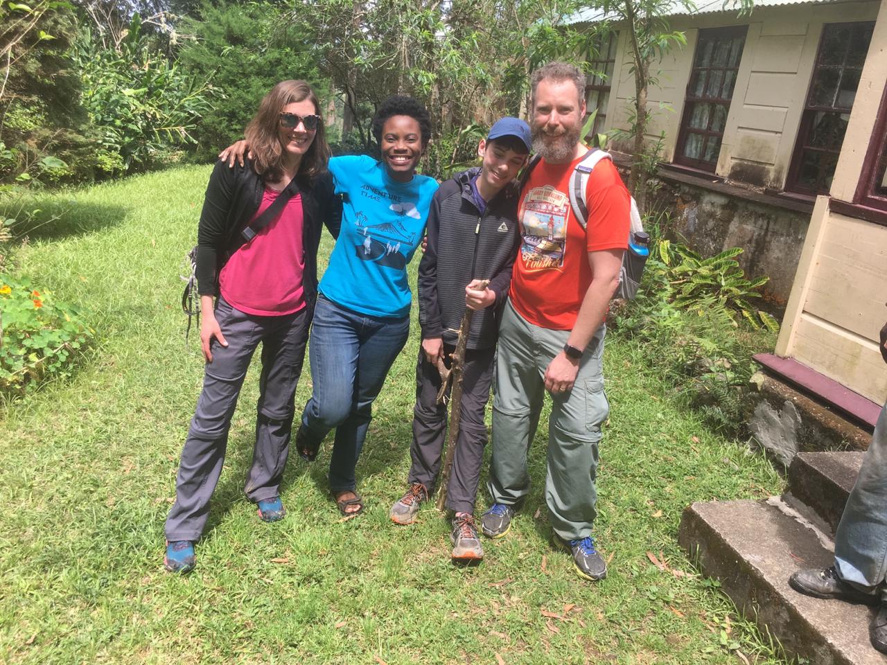 Blue Mountain Peak Cheryl Sherwood taking picture with a family traveling to Jamaica